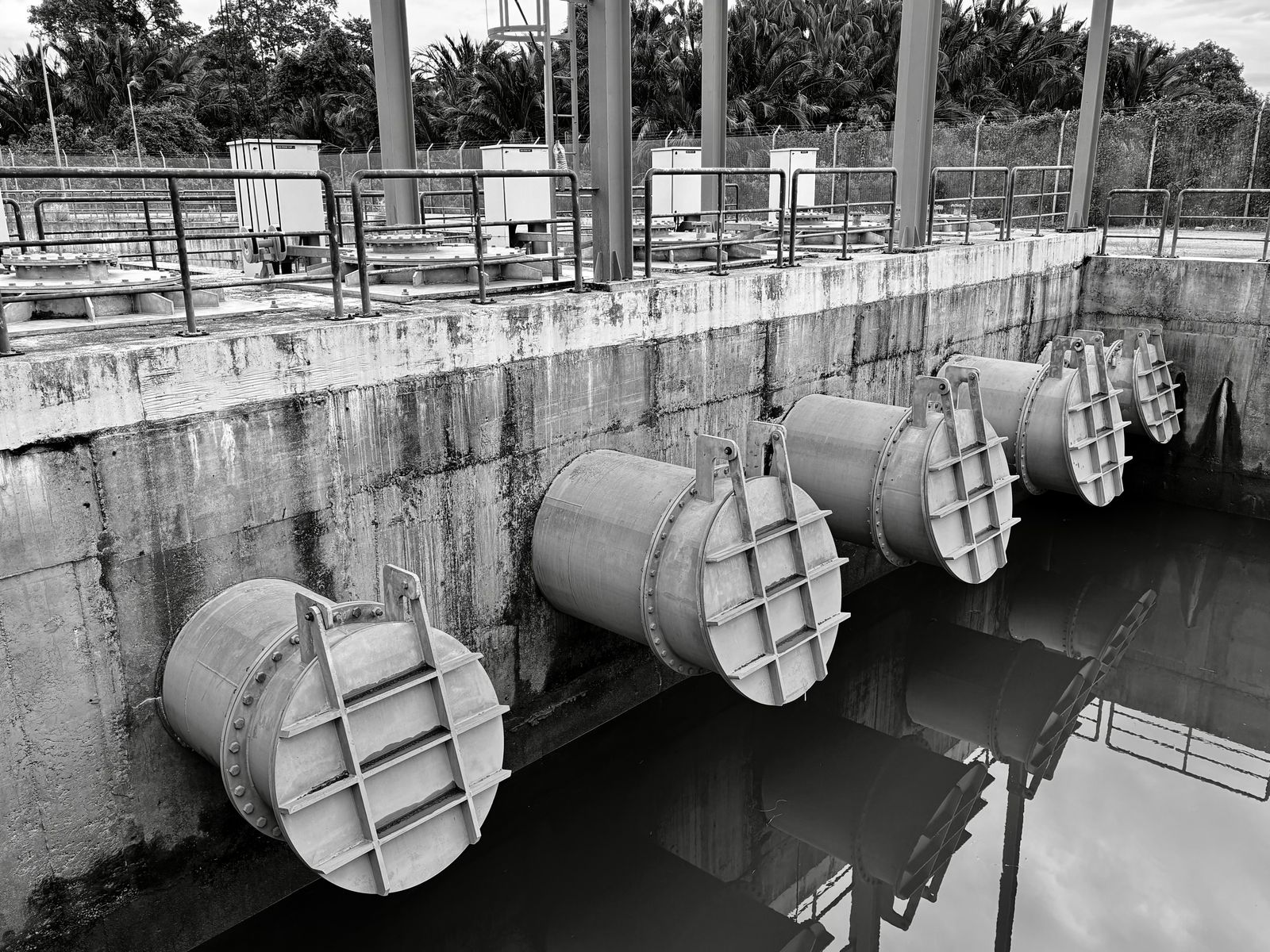 Industrial water pipelines fitted with isolation valves.